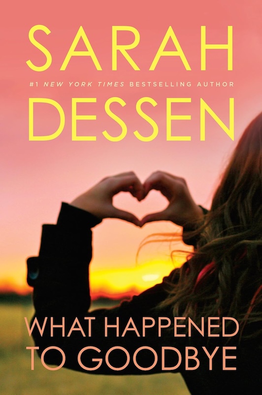 Cover of What Happened to Goodbye which shows a girl making a heart shape with her hands in front of a sunset