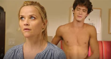 Reese Witherspoon with a young shirtless guy in Home Again