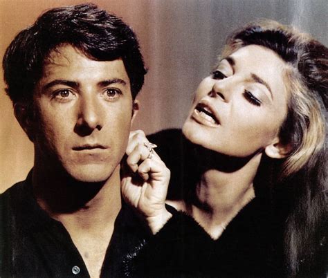 Photo of Dustin Hoffman and Anne Bancroft in the Graduate. A black and white photo of a woman tipping her head back and brushing the side of a younger man's face with her knuckles
