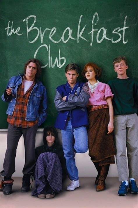 A photo of the cast against a chalkboard with The Breakfast Club written in chalk.