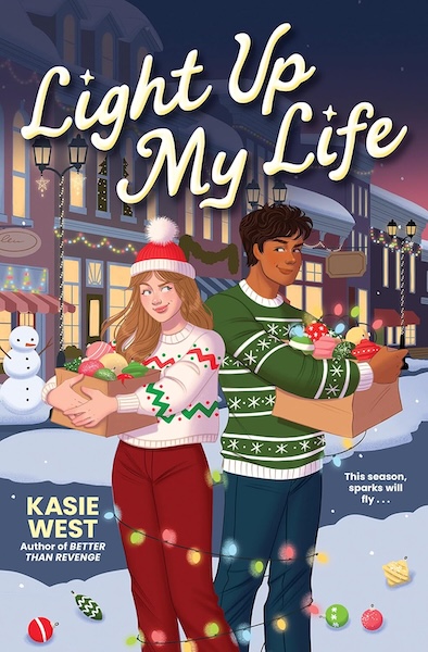 Cover of Light Up My Life by Kasie West which shows a teenage girl and guy back to back on a snowy street. This book is a hate to love YA holiday romance