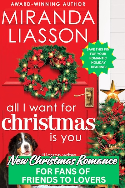 Cover of All I Want for Christmas is You. A phoot of a black and white dog in front of a red door with a wreath