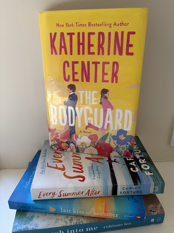 Original photo of The Bodyguard with other romance books